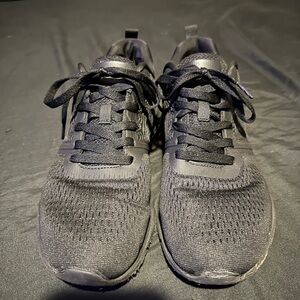 Sleek Black Knit Sneakers